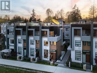 Located on the new Belle Isle Park, this stunning end-unit townhouse offers nearly 2,000 sq. ft. of...