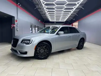 Experience luxury and power with the stunning Silver 2022 Chrysler 300 Touring L AWD. This sophistic...
