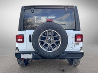This Jeep Wrangler boasts a Intercooled Turbo Premium Unleaded I-4 2.0 L/122 engine powering this Au... (image 5)