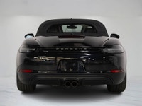 The 2018 Porsche 718 Boxster GTS embodies the essence of open-air performance with its mid-mounted 4... (image 9)