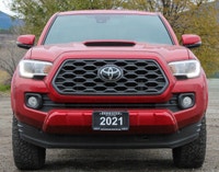 The 2021 Toyota Tacoma 4x4 Double Cab Auto is a striking truck that demands attention, dressed in a... (image 5)