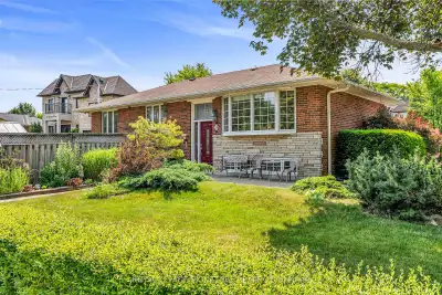 Tucked away on a sought after cul-de-sac, this extraordinary, spacious, and gracious bungalow has be...