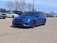 The pre-owned 2023 Subaru WRX Sport-Tech in WR Blue Pearl with a Black Alcantara interior delivers e... (image 1)
