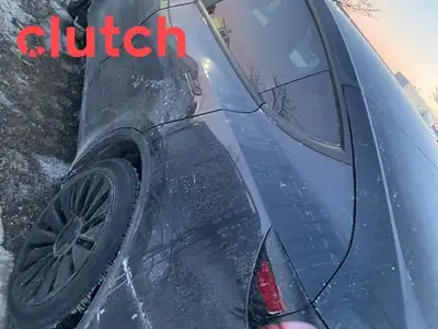 Power Tailgate/Hatch, Auto Dimming Rearview Mirror, Front Heated Seats and more! Clutch is the large...