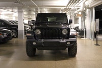This Jeep Wrangler has a dependable Gas/Electric V-6 3.6 L/220 engine powering this Automatic transm... (image 2)