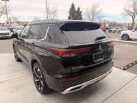 The 2023 Mitsubishi Outlander PHEV LE is a plug-in hybrid SUV that combines fuel efficiency, electri... (image 5)