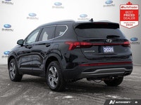 New Price! Odometer is 30316 kilometers below market average! Twilight Black 2021 Hyundai Santa Fe E... (image 2)