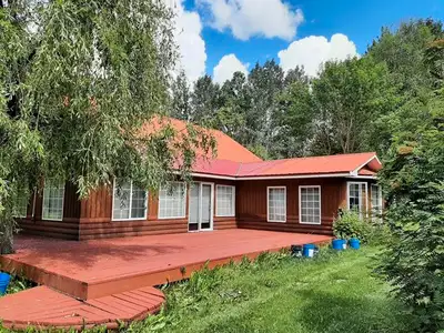 NEW LISTING 11409 HUFFMAN DRIVE, FORT ST. JAMES $410,000 Custom Log Home on 5.61 Private Acres with...