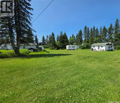 Fantastic acreage property NW of Meadow Lake! Nestled inside a wall of mature spruce trees, this 8.9...