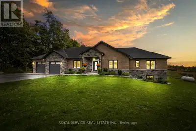 Set on just over two acres in the scenic hills of Cavan, 381 Sharpe Line is a custom-built, multi-ge...