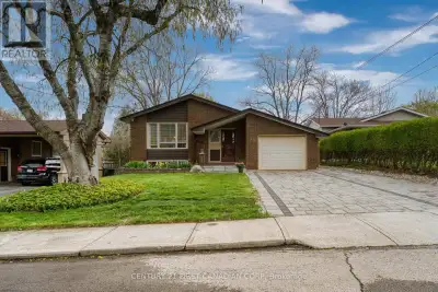 Welcome to this beautifully updated bungalow situated on a spacious 50 x 117 ft lot in a quiet cul-d...