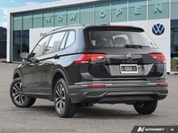 This Volkswagen Tiguan delivers a Intercooled Turbo Regular Unleaded I-4 2.0 L/121 engine powering t... (image 4)