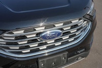 Command the road in this sleek 2023 Ford Edge Titanium, boasting a powerful Twin-Scroll 2.0L EcoBoos... (image 9)
