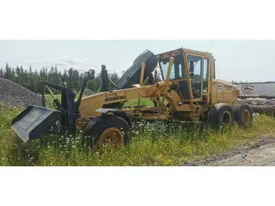 12,408, snow package, 13' mold board, 8' bull blade, 12' wing, Cummins engine, contact Jeff 705-493-...