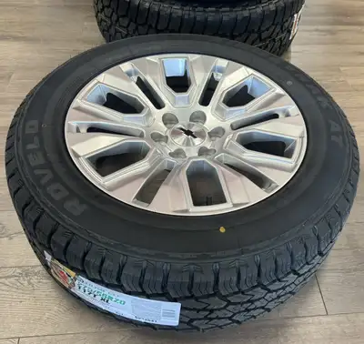 GMC / Chevy 1500 Hyper Silver GM Replica Rims & Rovelo RidgeTrak A/T All-Weather Tire Package Stock#...