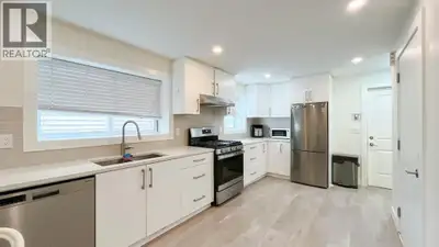 Fully renovated legal 3-bedroom, 1-bathroom ground-level suite in South Vancouver. This bright 1,087...