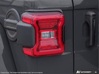 This Jeep Wrangler has a trusty Regular Unleaded V-6 3.6 L/220 engine powering this Automatic transm... (image 9)