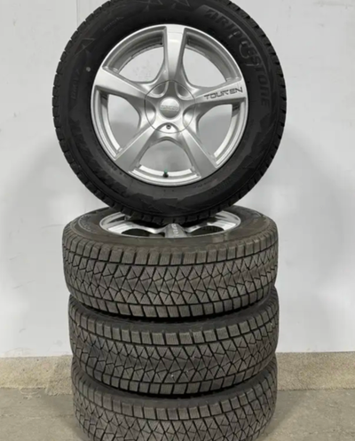 Subaru forester or outback custom dual 5x100 or 5x114.3 wheels or rims with 225 65 17 Bridgestone Bl...