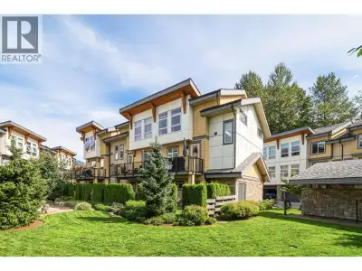 Seven Peaks by Polygon! Bright end-unit townhome in a well-managed community, ideal for families and...