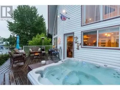 * PREC - Personal Real Estate Corporation. Lakefront living on popular Cluculz Lake! This renovated...