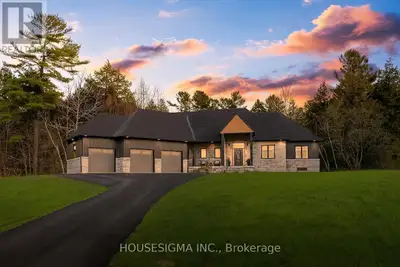Welcome to this stunning custom-built bungalow, perfectly situated on a sprawling lot just under 2 a...