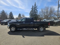 The 2018 Ram 2500 SLT is a heavy-duty pickup truck built to deliver exceptional strength, durability... (image 7)