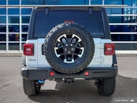 2.0L I4 DOHC. Bright White Clearcoat 2024 Jeep Wrangler Rubicon 4xe 4WD 8-Speed Automatic 2.0L I4 DO... (image 4)