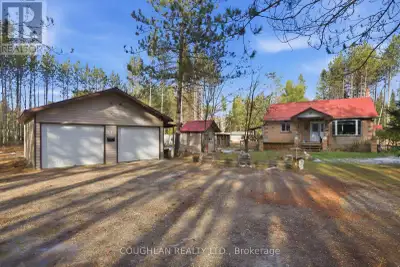 Escape to privacy in this charming 2-bedroom country home, nestled on over 11 acres of beautifully t...