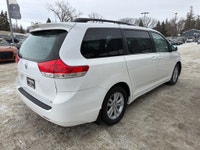 This 2014 Toyota Sienna LE in classic white is a proven, family-friendly minivan known for outstandi... (image 4)