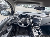 The 2018 Nissan Murano Sport Utility, with 67,213 kilometers, is meticulously designed to merge soph... (image 8)