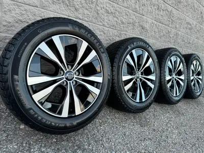 Michelin X-Ice Snow SUV Winter Tires and original 18 Inch Volvo XC 40 two-tone black rims. Good for...
