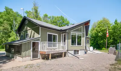 This custom built executive home offers lots of privacy sitting on 29 acres of nature backing onto a...