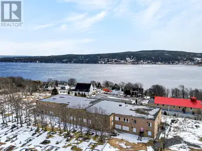 Welcome to 6 Church Road, Carbonear, the former Davis Elementary. Solid concrete and steel construct...