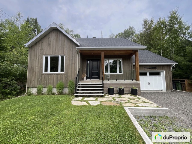 $675,000 - Bungalow for sale in St-Adolphe-D'Howard — photo 1
