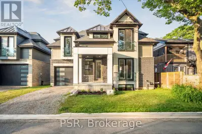 Discover your ideal coastal retreat tucked away on a peaceful, private laneway just steps from Lake...