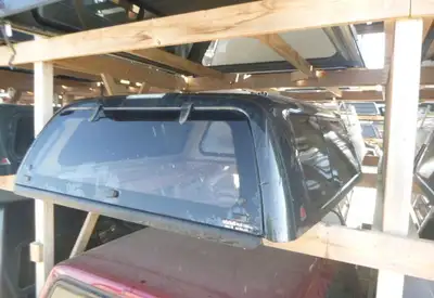 Chevrolet Silverado 2007 - 2013 Chevrolet Silverado 5'8 Black Truck Cap This unit is in good conditi...