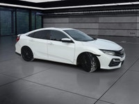 The 2020 Honda Civic Si Sedan in white offers a dynamic driving experience with its FWD drivetrain a... (image 1)
