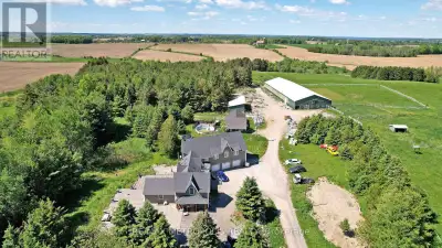 Set on 99 acres of rolling farmland, pasture, and mature woods, this exceptional country property of...