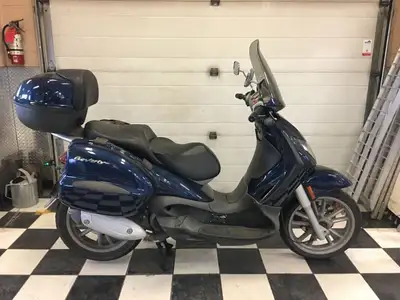 This is a 2006 Piaggio BV 250 mechanic's special for $1200. + gst. The scooter has 37,143 kms , is s...