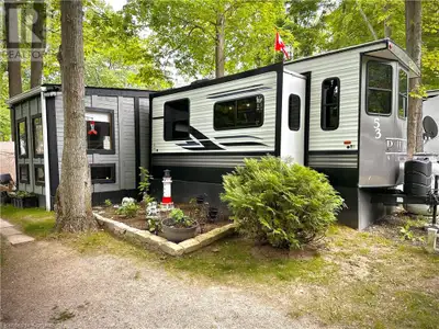 Located in the desirable Sandy Acres Park, this spacious 4-season mobile home offers comfortable yea...