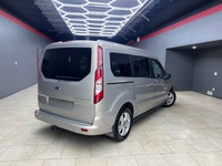 Experience the elegance and sophistication of the gold 2015 Ford Transit Connect Wagon Titanium with... (image 2)
