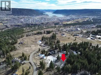 One of the very last undeveloped lots on desirable Woodland Drive. Within city limits, this 2.32 acr...