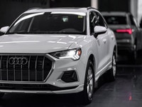 The 2025 Audi Q3 40 TFSI Komfort with the Convenience Package is a sophisticated, driver-centric lux... (image 2)