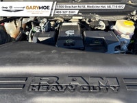 The 2023 Ram 2500 Laramie, in a striking black finish and equipped with a robust 4x4 drivetrain, pro... (image 6)