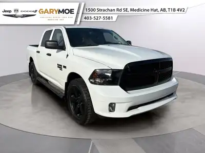Experience the robust presence of the 2020 Ram 1500 Classic Express, finished in a striking White ex...