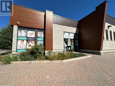 Modern, Newer, & Chic Building with Main Street Exposure. Fully Divided and setup for a Pharmacy/Med...