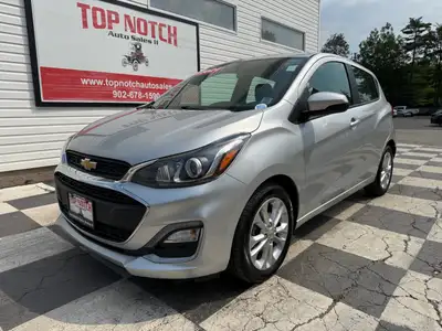 A compact and efficient hatchback with modern convenience features, easy maneuverability, and city-f...