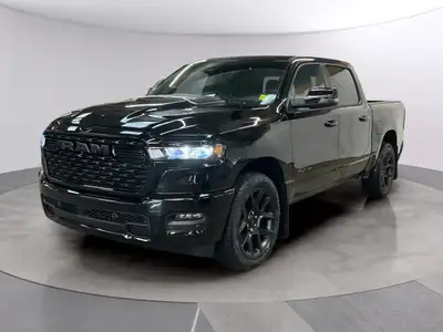 Experience the power and style of the 2026 Ram 1500 Sport, a striking black 4x4 truck designed to ha...