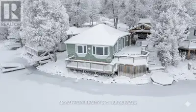 Welcome to 19 Cherry Lane, a beautifully appointed, three-bedroom, two-bath property that fuses rust...