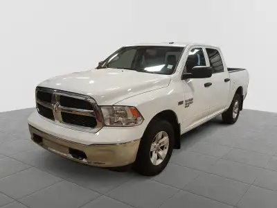Harness legendary muscle and time-tested capability with the robust 2023 Ram 1500 Classic SLT, the 4...
